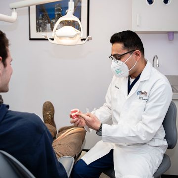 Dentist with patient at Westwood Dental Group