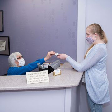 Staff Helping Patient
