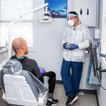 Dentist Communicating with Patient